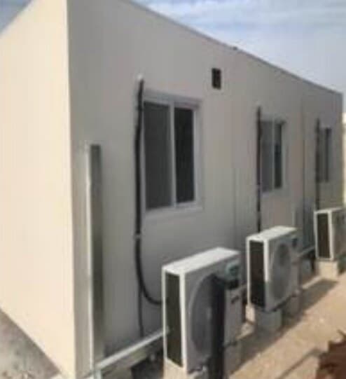 Completed precast modular building with AC units