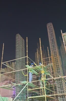 Rebar cages at night