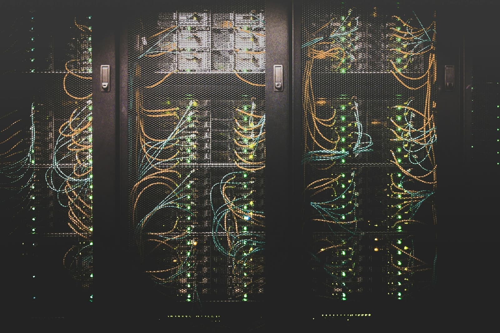 Network racks with patched structured cabling